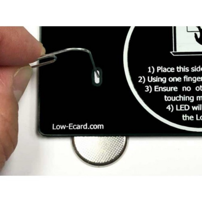 Person replacing the battery on EDTM's Low-E CARD+ low E meter for Express Window Films product page